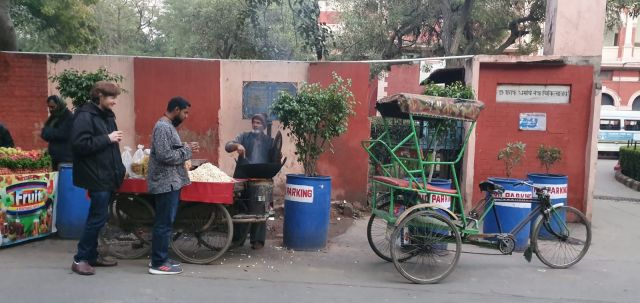 Matt joins Puneeth as he gets his daily helping of peanuts roasted in sand